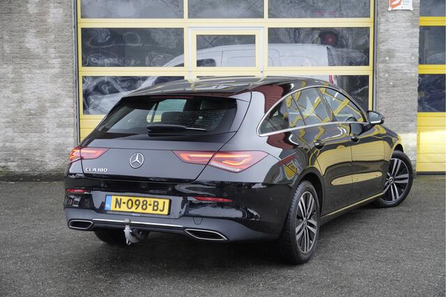 Mercedes-Benz CLA-KLASSE Shooting Brake 180 Automaat! Business Solution BJ2021 Lmv 17" | Led V+A | Pdc | Navi | Elek. trekhaak | Elek. achterklep | Achteruitrijcamera | Virtual cockpit | Climate control | Cruise control | Verwarmde voorstoelen | Sportstoelen | Zwarte hemel | Geti