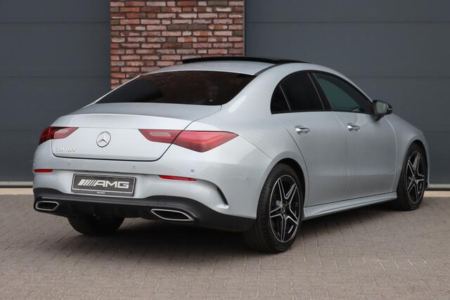 Mercedes-Benz CLA-KLASSE 180 Star Edition AMG Line | Panoramadak | Distronic | Camera | Sfeerverlichting | Keyless Go | Multibeam LED | Zitcomfortpakket | Nightpakket |