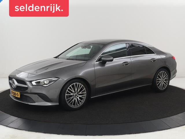 Mercedes-Benz CLA-KLASSE 180 Business Solution Progressive | Stoelverwarming | Carplay | Sfeerverlichting | Half leder | Camera | Navigatie | Widescreen | Full LED | Park Assist | DAB | 18'' velgen | Cruise control
