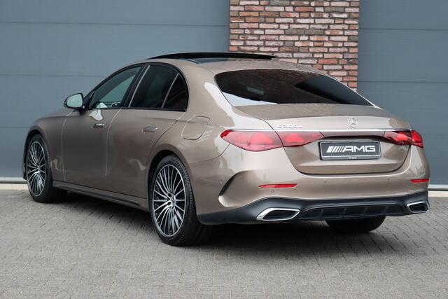 Mercedes-Benz E-KLASSE 300 e AMG Line | Hyperscreen | Airmatic | Achterasbesturing | Distronic+ | Stoelventilatie | Memory | Burmester | HUD | Digital Light | Surround Camera | Verwarmd Stuurwiel |