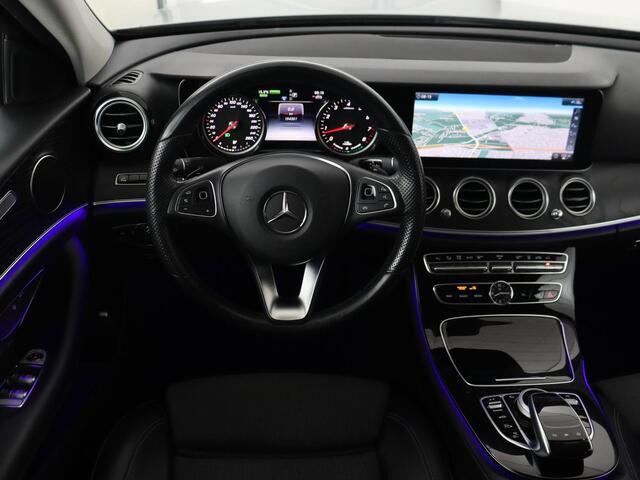 Mercedes-Benz E-KLASSE 350e Avantgarde | Luchtvering | Trekhaak | Stoelverwarming | Carplay | 360 Camera | Sfeerverlichting | Navigatie | Park Assist | Half leder | Full LED | PHEV | Plug In