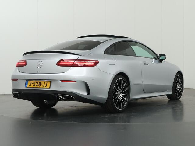 Mercedes-Benz E-KLASSE Coupé 200 Premium Plus | AMG | Night | Panoramadak | Memory | Burmester | Rijassistentiepakket | Lederen bekleding | 20" lichtmetalen velgen |