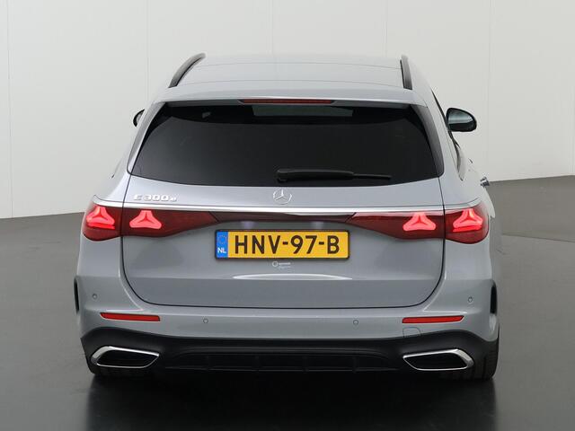 Mercedes-Benz E-estate 300 e AMG Line | Superscreen | Burmester | Verlichte grill | 20" lichtmetalen velgen | Panoramadak | Trekhaak |