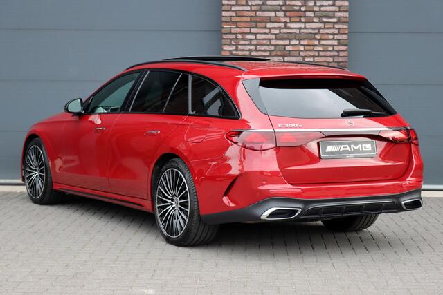 Mercedes-Benz E-estate 300 e AMG Line | Distronic | Panoramadak | Memory | Trekhaak | Soft-Close | Surround Camera | Digital Light | Verwarmd Stuurwiel | Keyless Go | Nightpakket |