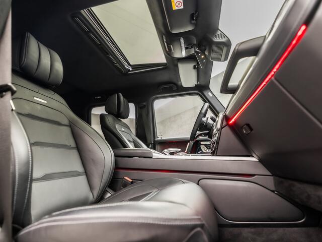 Mercedes-Benz G-KLASSE 63 AMG 585Pk (SCHUIFDAK, ALCANTARA HEMEL, SFEERVERLICHTING, ADAPTIVE CRUISE, LEDER DASHBOARD, APPLE CARPLAY, TREKHAAK, NIEUWSTAAT)