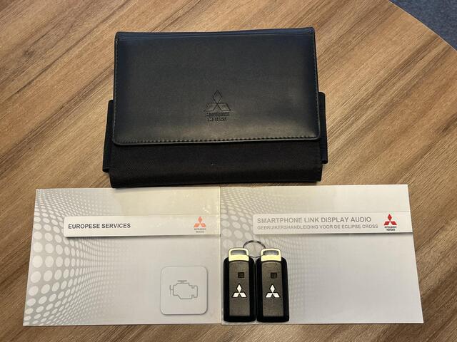 Mitsubishi ECLIPSE Cross 1.5 DI-T First Edition / Head-Up Display / 360° Camera / Navigatie via Apple Carplay & Android Auto / Stoelverwarming voor / Keyless Entry & Start / 1600kg trekken / Cruise- en Climate Control / Dodehoek Detectie / Parkeersensoren voor en achter / 