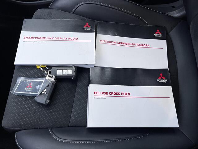 Mitsubishi ECLIPSE Cross 2.4 PHEV Business Executive 4WD Automaat / Fabrieksgarantie tot 11-2031 mogelijk ** / Goed onderhouden / Camera 360° / Stuur-, stoel- en achterbankverwarming / Adaptieve Cruise Control / Apple Carplay Android / 18" LM wielen met All Season banden /