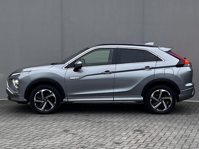 Mitsubishi ECLIPSE Cross 2.4 PHEV Business Executive 4WD Automaat / Fabrieksgarantie tot 11-2031 mogelijk ** / Goed onderhouden / Camera 360° / Stuur-, stoel- en achterbankverwarming / Adaptieve Cruise Control / Apple Carplay Android / 18" LM wielen met All Season banden /