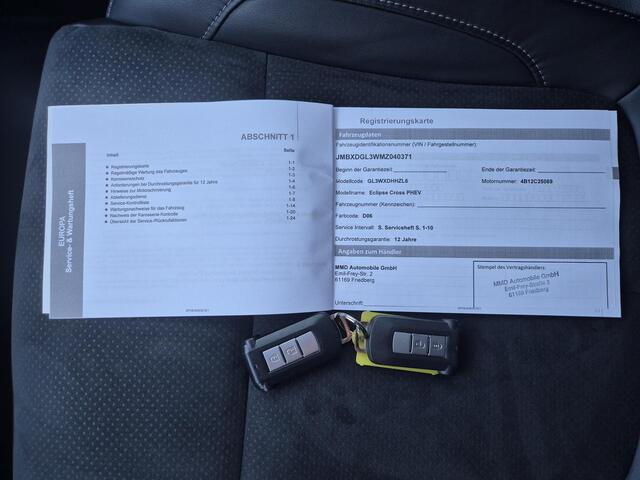 Mitsubishi ECLIPSE Cross 2.4 PHEV Plug-in Executive Automaat / Fabrieksgarantie tot 12-2030 mogelijk ** / Allseason banden / Trekgewicht 1500 kg / Stuur-. Stoel en Achterbank verwarming / Rondomzicht camera /