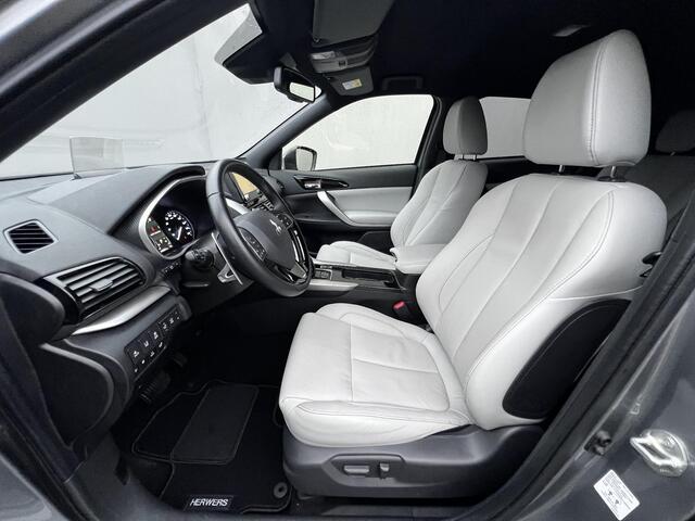 Mitsubishi ECLIPSE Cross 2.4 PLUG-IN HYBRID 4WD S-AWC Executive Automaat / Fabrieksgarantie tot 12-2032* / Trekhaak 1.500 kg / Leder / Elektrische stoelen / Navigatie / Stuur-, stoel - & achterbankverwarming / HUD / Camera 360° / 18" LM wielen + All Season banden /