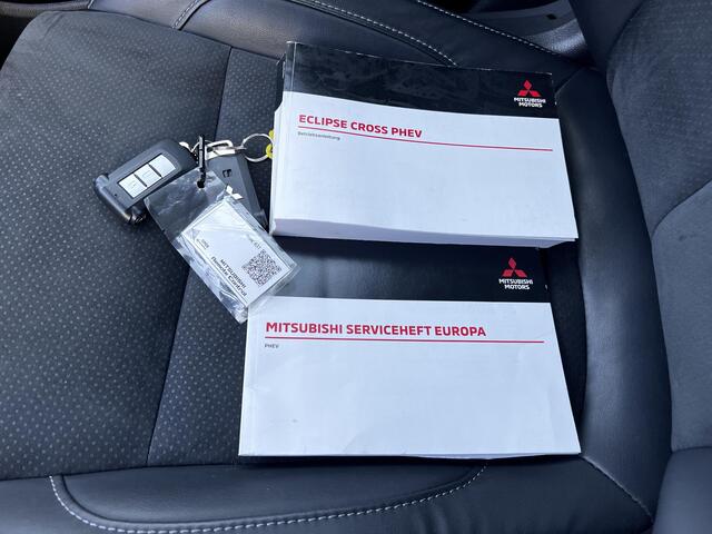 Mitsubishi ECLIPSE Cross 2.4 PHEV Intense+ 4WD S-AWC Automaat / 8 jaar Fabrieksgarantie / 1.500 kg trekgewicht / Elektrische bestuurdersstoel / Navigatie / Stoelverwarming / Apple Carplay Android / 18" LM wielen /