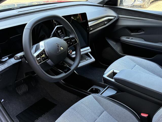 Mitsubishi ECLIPSE Cross Intense 87 kWh NIEUW UIT VOORRAAD LEVERBAAR | Warmtepomp | Apple CarPlay & Android Auto | Adaptieve Cruise Control | Verwarmbare voorstoelen | Elektrisch bedienbare achterklep | Navigatiesysteem | 8 jaar fabrieksgarantie