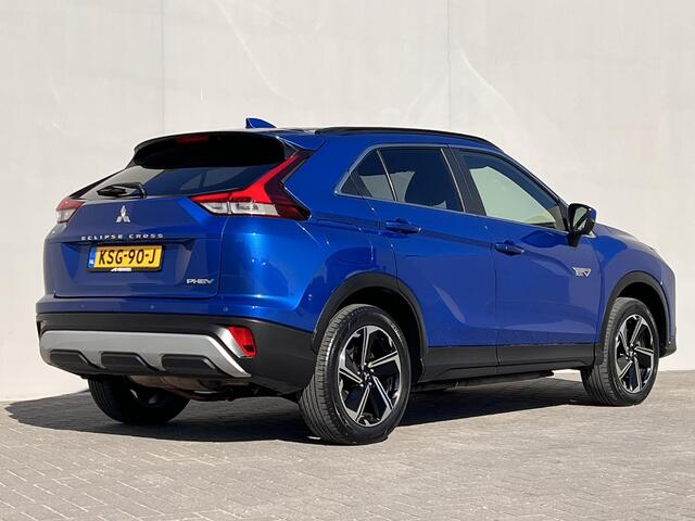 Mitsubishi ECLIPSE Cross 2.4 PHEV First Edition 4WD S-AWC / Dealer onderhouden / Accu SoH 99,2 % / Fabrieksgarantie tot 02-2030 / ChadeMo snel laden / 1.500 kg trekgewicht / HUD / Camera 360° / Stuur-, stoel- & achterbankverwarming / 18" LM wielen / Winterwielen inclusief /