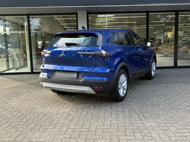 Mitsubishi GRANDIS 1.8 HEV Intense NIEUW UIT VOORRAAD LEVERBAAR | Appele CarPlay & Android Auto | Parkeersensoren achter | Licht- regensensor | Achteruitrijcamera | Climate Control | Cruise Control | 8 jaar fabrieksgarantie