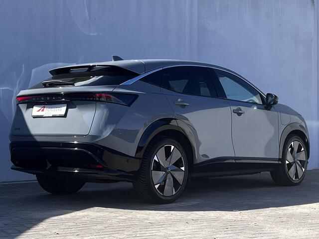 Nissan Ariya Evolve 91 kWh Automaat / Weinig km / Elektr. Schuifdak, stoelen en klep / Navigatie / Stoelverwarming / Stoelventilatie / 20" LM wielen & All Season banden / Apple Carplay Android /