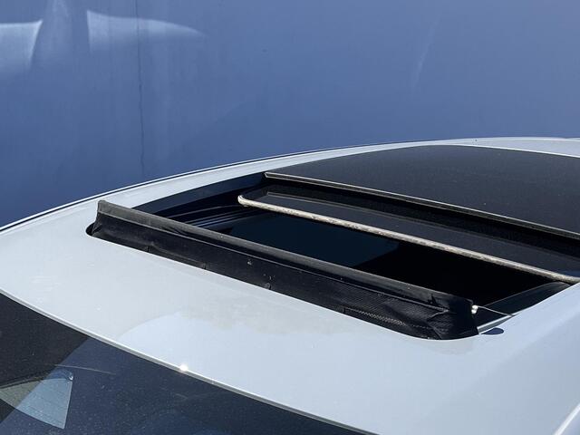Nissan Ariya Evolve 91 kWh Automaat / Weinig km / Elektr. Schuifdak, stoelen en klep / Navigatie / Stoelverwarming / Stoelventilatie / 20" LM wielen & All Season banden / Apple Carplay Android /