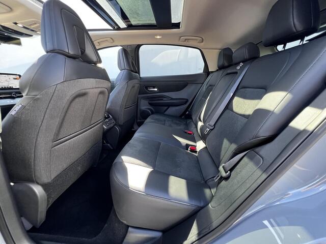 Nissan Ariya Evolve 91 kWh Automaat / Weinig km / Elektr. Schuifdak, stoelen en klep / Navigatie / Stoelverwarming / Stoelventilatie / 20" LM wielen & All Season banden / Apple Carplay Android /