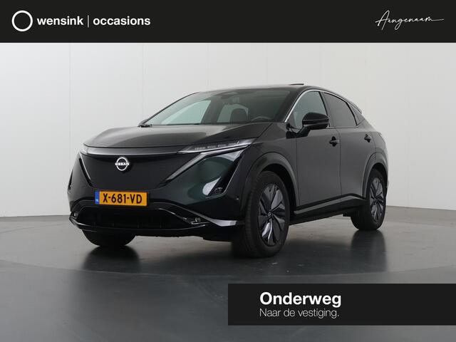 Nissan Ariya Evolve 91 kWh | SOH 99,2% | Apple Carplay/Android Auto | Stoelverwarming/verkoeling | Luxe lederen bekleding | Panoramadak | 360 camera | HUD | Memory stoelen |