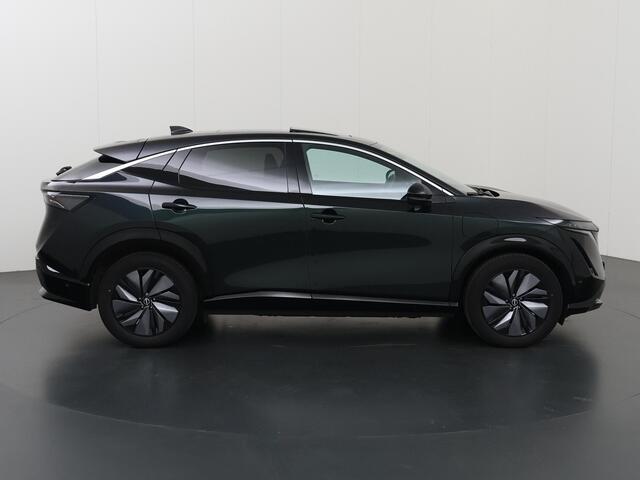 Nissan Ariya Evolve 91 kWh | SOH 99,2% | Apple Carplay/Android Auto | Stoelverwarming/verkoeling | Luxe lederen bekleding | Panoramadak | 360 camera | HUD | Memory stoelen |