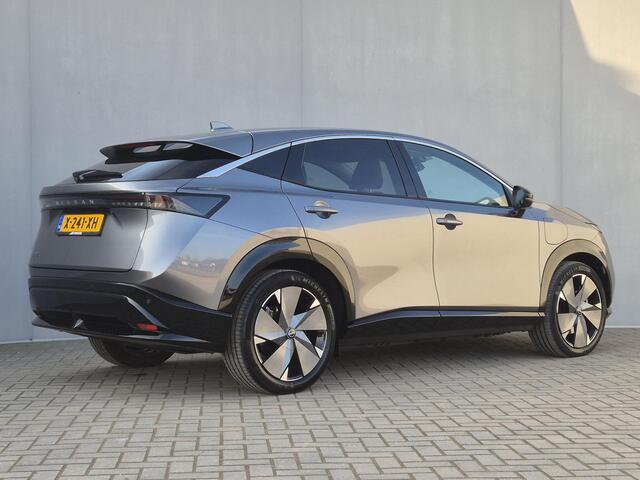 Nissan Ariya Advance 66 kWh Automaat / Accu SOH 99% / Fabrieksgarantie tot 02-2027 / CCS snelladen / Elektrische achterklep / Stuur-& Stoel verwarming / Adaptief cruise control / 360 camera / warmtepomp / Apple Carplay Android Auto /