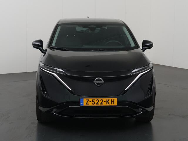 Nissan Ariya Advance 91 kWh | SOH 98% | Ele.verstelbare stoelen | Digitaal Dashboard | Navigatie | 360 Camera | LED | DAB | Apple CarPlay/ Android Auto | Rijassistent-Systeem | Ele. achterklep | Adaptieve Cruise Control |