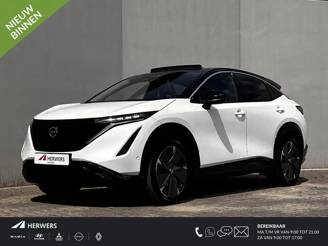 Nissan Ariya Evolve 91 kWh Dealer onderhouden / Accu SoH 99 % / Panorama schuifdak / HUD / Navigatie / Apple Carplay Android / Elektrische stoelen & klep / BOSE / Stoelventilatie / Stoel-, stuur- en achterbankverwarming / 20" LM wielen /