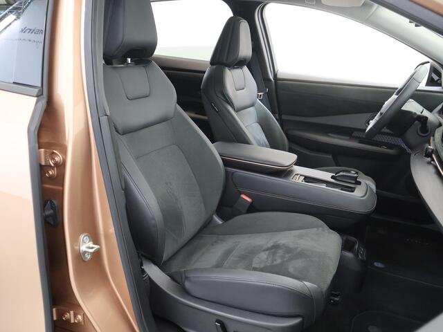 Nissan Ariya Trend Plus 91 kWh | SOH 99% | Trekhaak | Elektrisch verstelbare stoelen + Geheugen | BOSE audio | Stoelverwarming voor + achter | Navigatie | 360 Camera | DAB | Apple CarPlay/Android Auto | Stuurverwarming | Panoramadak | HUD | Adaptieve Cruise Control | 