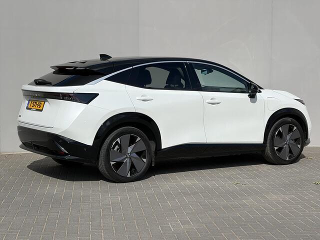 Nissan Ariya Evolve 91 kWh / Stoelverwarming voor en achter / Schuif-kantel dak / Stoelventilatie / Stuurverwarming / 100% dealer onderhouden / Elektrisch verstelbare stoelen met geheugen / Elektrische achterklep / Adaptieve cruise control