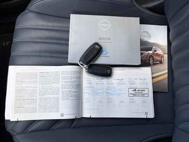 Nissan Ariya Evolve 91 kWh / Stoelverwarming voor en achter / Schuif-kantel dak / Stoelventilatie / Stuurverwarming / 100% dealer onderhouden / Elektrisch verstelbare stoelen met geheugen / Elektrische achterklep / Adaptieve cruise control