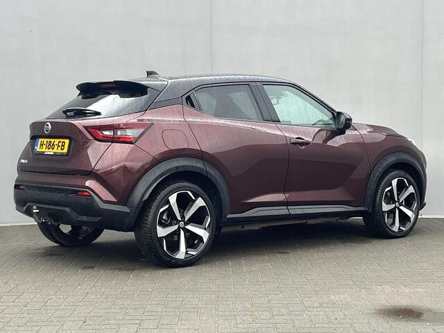 Nissan JUKE 1.0 DIG-T Premiere Edition / Trekhaak (Trekgewicht 1.250kg) / Dealeronderhouden / Achteruitrijcamera / Apple Carplay & Android Auto / Keyless Entry & Start / Navigatie full map / Cruise- en Climate Control / Stoelverwarming / Voorruitverwarming / Parkeers