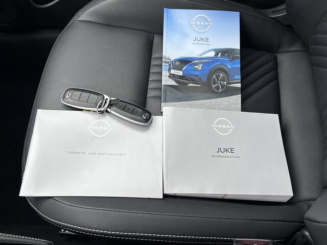 Nissan JUKE 1.0 DIG-T Tekna Automaat / Cold Pack / Leder / Navigatie / Camera 360° / Stuur- en stoelverwarming / Voorruitverwarming / Apple Carplay Android / 19" LM + All Season banden /