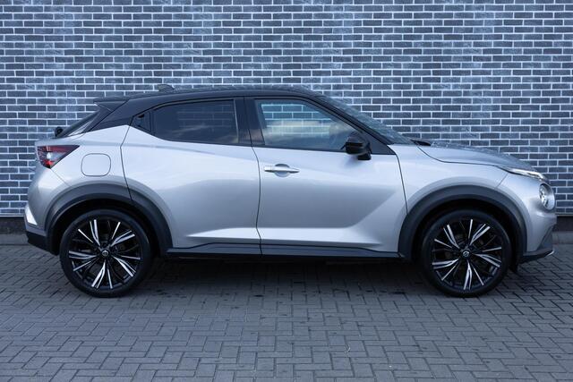 Nissan JUKE 1.0 DIG-T 116 Premiere Edition | Two-Tone | Achteruitrijcamera | Parkeersensoren | Stoelverwarming | Verwarmde Voorruit | Keyless Entry | LED Koplampen | Navigatie | Apple Carplay | Android Auto | Lichtmetalen Velgen 19 inch