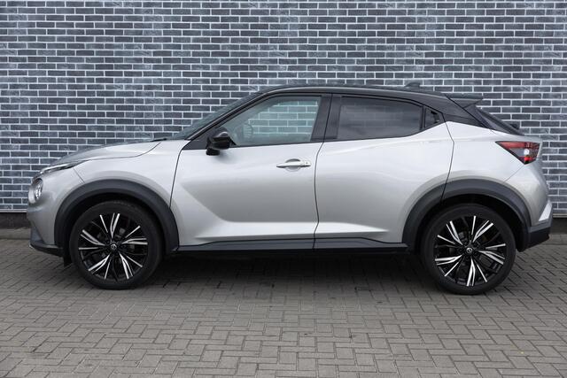 Nissan JUKE 1.0 DIG-T 116 Premiere Edition | Two-Tone | Achteruitrijcamera | Parkeersensoren | Stoelverwarming | Verwarmde Voorruit | Keyless Entry | LED Koplampen | Navigatie | Apple Carplay | Android Auto | Lichtmetalen Velgen 19 inch