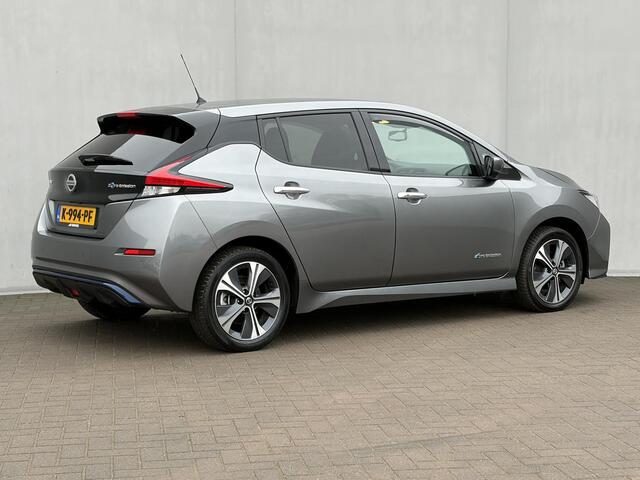 Nissan LEAF e+ Tekna 62 kWh / Adaptieve cruise control / 360 Graden camera / 100% onderhouden/ Stoelverwarming voor en achter / Navigatie / All season banden