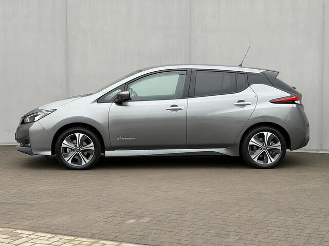 Nissan LEAF e+ Tekna 62 kWh / Adaptieve cruise control / 360 Graden camera / 100% onderhouden/ Stoelverwarming voor en achter / Navigatie / All season banden