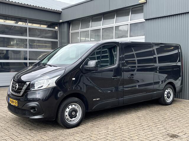 Nissan NV300 1.6 dCi 120 L2H1 Dubbele schuifdeur Airco Cruise control Trekhaak 2000kg Bluetooth telefoon voorbereiding Navigatie Achteruitrijcamera Parkeersensoren achter Kastinrichting Euro 6