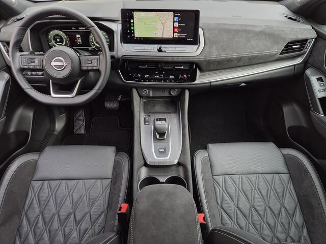 Nissan QASHQAI 1.3 MHEV Xtronic Tekna Plus / Fabrieksgarantie tot 10-2028 / Panoramadak / All season banden / Trekgewicht 1800 kg / Head Up Display / Bose Audio Systeem / Elektrische achterklep / Stuur- Stoel & Voorruit verwarming / Rondomzicht camera / Adaptief cruise 
