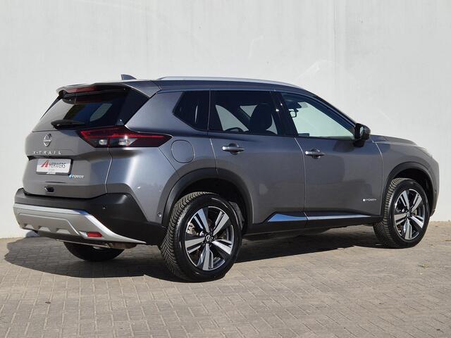 Nissan X-TRAIL 1.5 e-Power Tekna Automaat / Cold Pack / HUD / Stoel-, Stuur en Achterbankverwarming / Rondomzicht camera / Allseason Banden / Elektrische achterklep / Adaptief CC / Apple Carplay Android Auto /