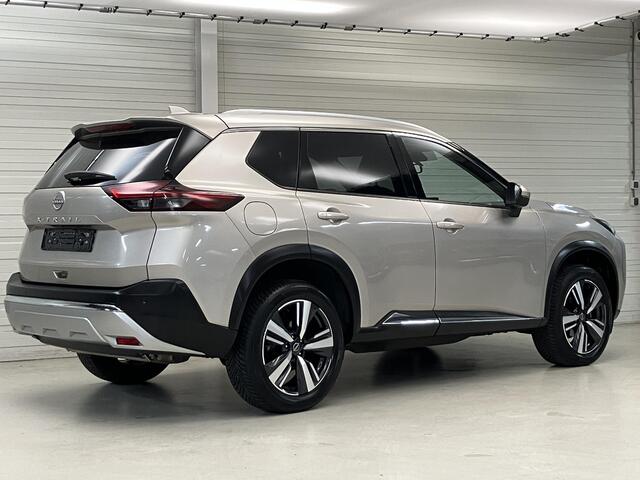 Nissan X-TRAIL 1.5 MHEV 163pk 5-Zits Tekna Automaat / 2000 KG Trekgewicht / Navigatie / 360 Graden Camera / Stoel- en Stuurverwarming / Verwarmde Voorruit / Fabrieksgarantie tot 07-2027 / Elektrische Kofferbak / Elektrische Stoelen met Geheugen /
