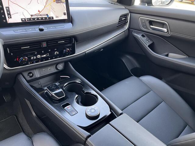 Nissan X-TRAIL 1.5 e-4orce Tekna 4WD Automaat / Fabrieksgarantie tot 10-2027 / 1.800 kg trekgewicht / Navigatie / Elektr. stoelen en klep / Stuur-, stoel- en achterbankverwarming / HUD / Camera 360° / 19" LM wielen met All Season banden /