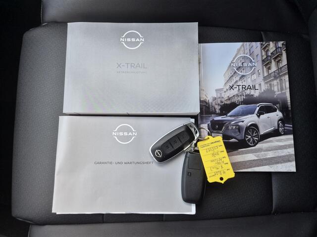 Nissan X-TRAIL 1.5 MHEV 163pk Tekna Automaat / Fabrieksgarantie tot 28-04-2028 / Trekgewicht 2000 kg / Allseason banden / HUD / Elektrische achterklep / Stuur-, Stoel en Achterbank verwarming / Rondomzicht camera /
