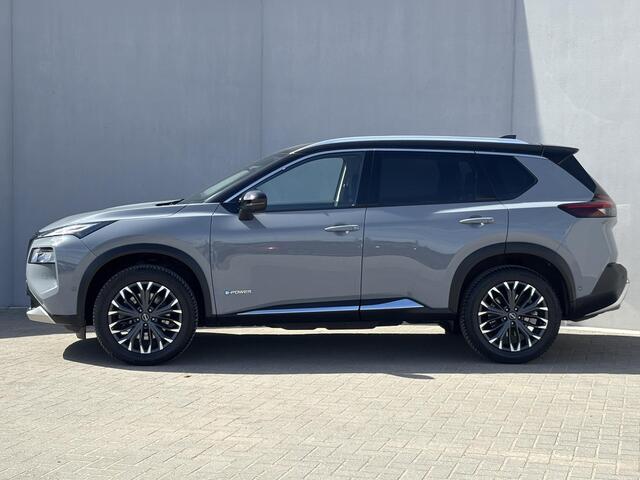 Nissan X-TRAIL 1.5 e-4orce Tekna 4WD Automaat / 1800 kg Trekgewicht / Fabrieksgarantie tot 07-2028<100.000km / Dealer onderhouden / All Season banden / Head Up Display / Elektrische achterklep / Adaptief cruise control / Rondomzicht camera /