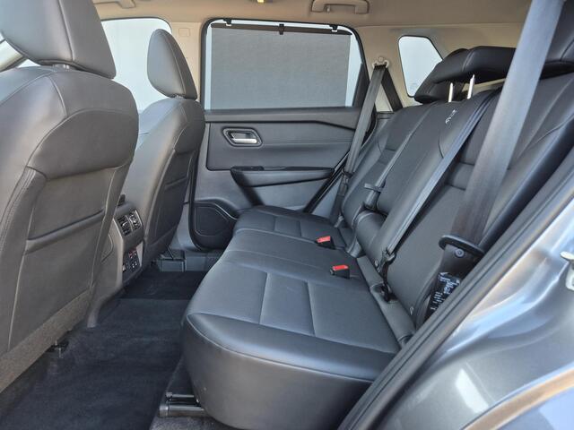 Nissan X-TRAIL 1.5 e-Power Tekna Automaat / Schuifdak / Fabrieksgarantie tot 04-2028<100.000 / All season banden / Head Up Display / Elektrische achterklep / / Stuur-, Stoel & Achterbank verwarming / Adaptief cruise control /