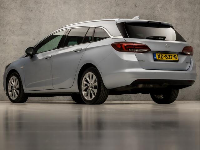 Opel ASTRA Sports Tourer 1.4 Innovation 150Pk Automaat (APPLE CARPLAY, GROOT NAVI, CLIMATE, CAMERA, LEDER, SPORTSTOELEN, ADAPTIVE CRUISE, PARKEERSENSOREN, LANE ASSIST, NIEUWE APK, NIEUWSTAAT)