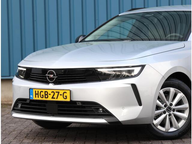 Opel ASTRA Sports Tourer 1.2 110PK Turbo Business Edition | AppleCarPlay/AndroidAuto | Camera | Navigatie | Stoel/Stuur verwarmd | AGR Bestuurdersstoel | Adaptive CruiseControl | Isofix | Privacy Glass |