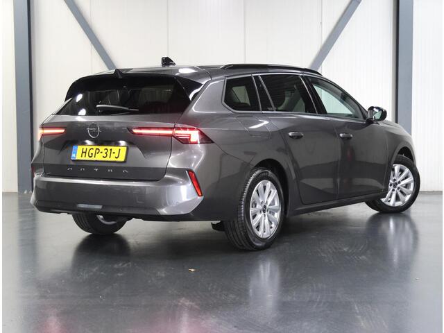 Opel ASTRA Sports Tourer 1.2 110PK Turbo Business Edition | 1ste eigenaar | AppleCarPlay/AndroidAuto | Camera | Navigatie | Stoel/Stuur verwarmd | AGR Bestuurdersstoel | Adaptive CruiseControl | Isofix | Privacy Glass |