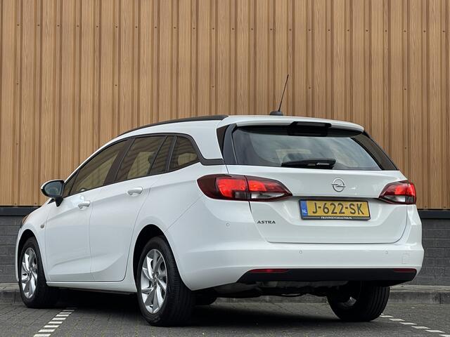 Opel ASTRA Sports Tourer 1.2 Edition | Cruise Control | Parkeersensoren Achter | Apple Carplay/Android Auto | DAB | Navigatie |