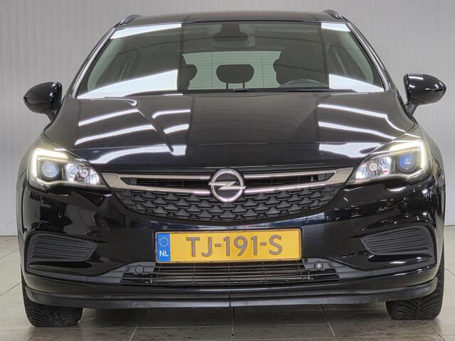 Opel ASTRA Sports Tourer 1.0 Online Edition/ PDC V+A/ LED Dagrijverl./ Apple + Android/ DAB+/ Navi/ Airco/ Cruise/ Elek. pakket/ Isofix/ Bluetooth/ Multi. LEDER. Stuur/ Metallic lak.
