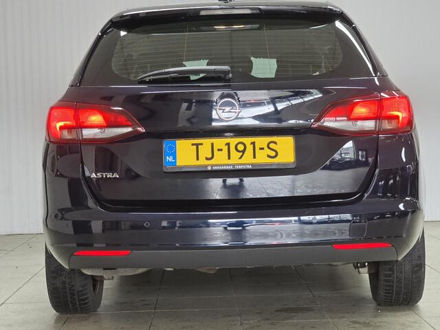 Opel ASTRA Sports Tourer 1.0 Online Edition/ PDC V+A/ LED Dagrijverl./ Apple + Android/ DAB+/ Navi/ Airco/ Cruise/ Elek. pakket/ Isofix/ Bluetooth/ Multi. LEDER. Stuur/ Metallic lak.