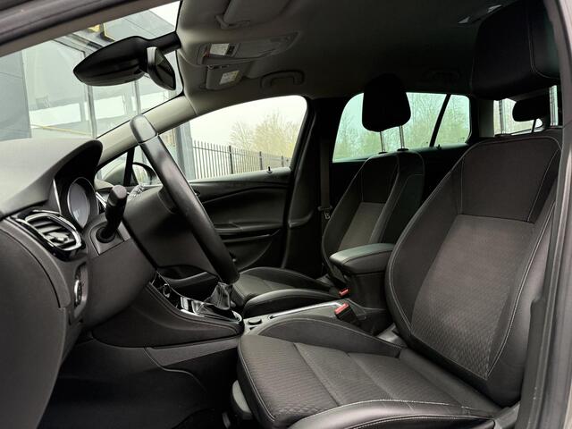 Opel ASTRA Sports Tourer 1.4 Innovation 2e Eigenaar,Navi,Camera,Trekhaak,150pk,Clima,Cruise,Lm velgen,Pdc V+A,N.A.P,Doedehoek,6 Bak,Halfleder,Nieuwe Apk bij Aflevering